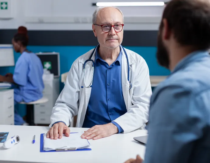 Doctor and nurse discussing labwork
